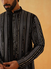 SOJANYA LUXE Striped Embroidered Sequinned Georgette Straight Kurta With Trousers